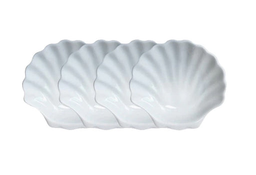 4 shell plates over white background