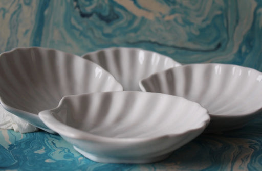 Chef Etoile Shell Plates on a table