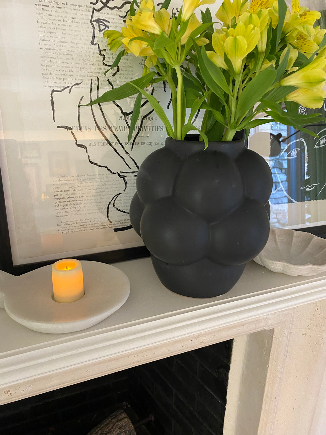 marble dish with candle on top